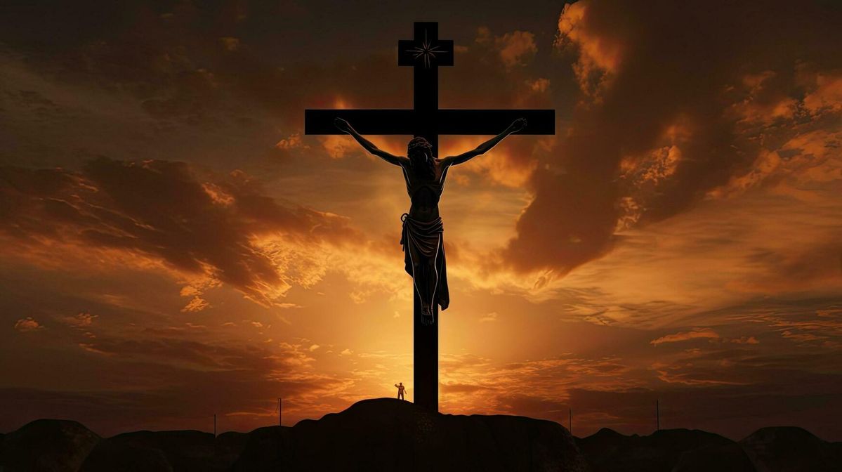 Crucifix silhouetted against a dramatic sky