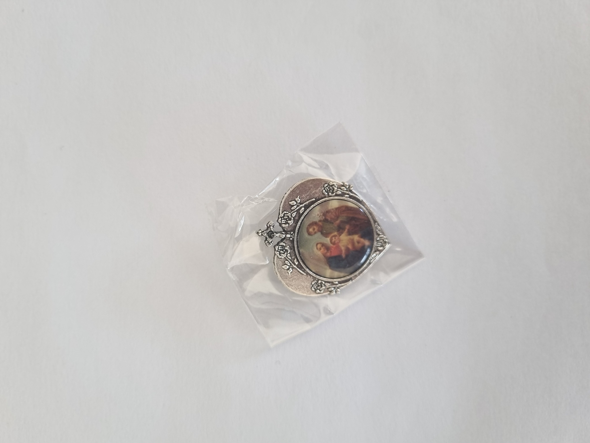 Silver-tone Holy Family brooch with oval religious image