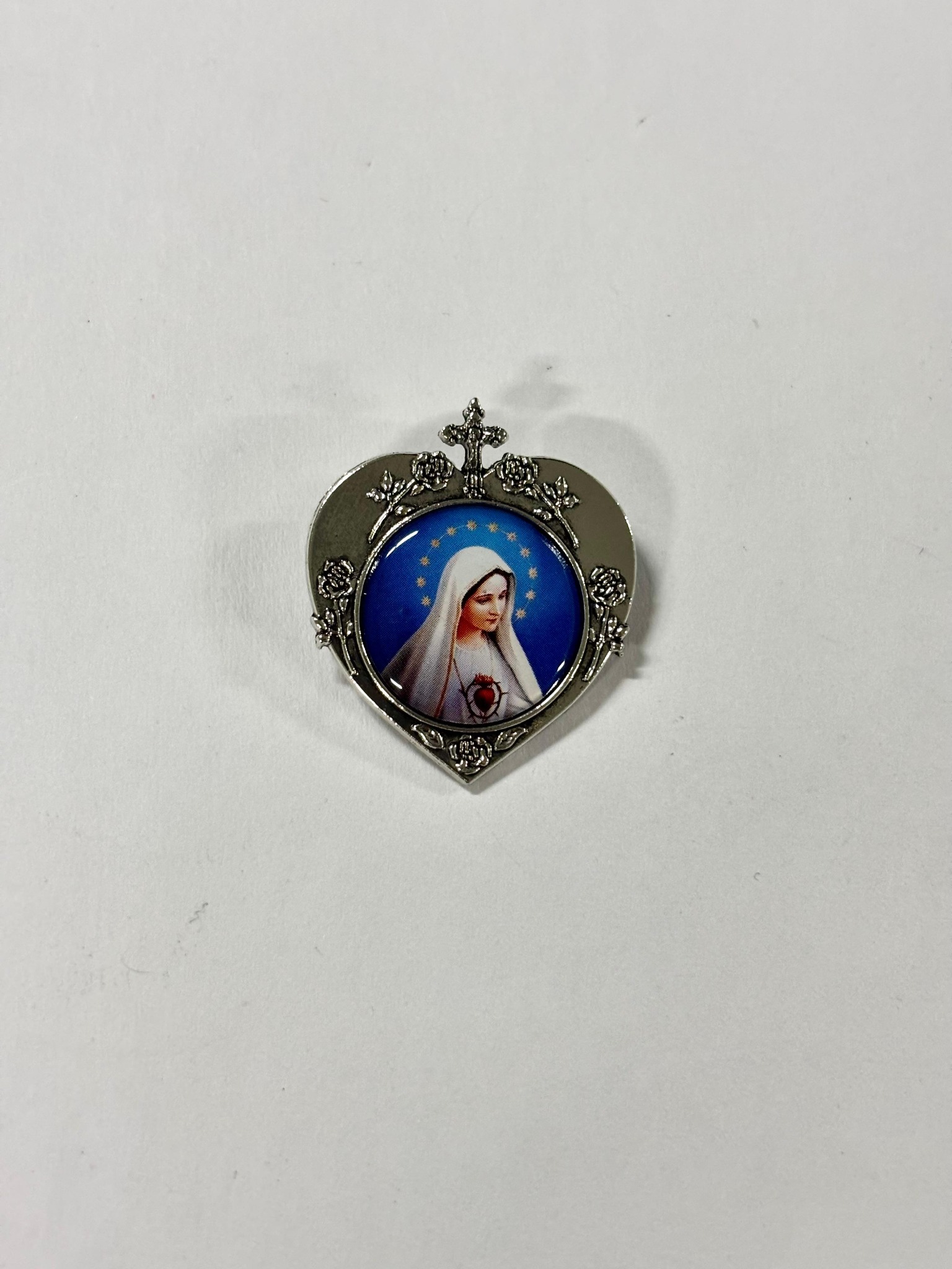 Silver-tone heart brooch featuring Our Lady of Fatima