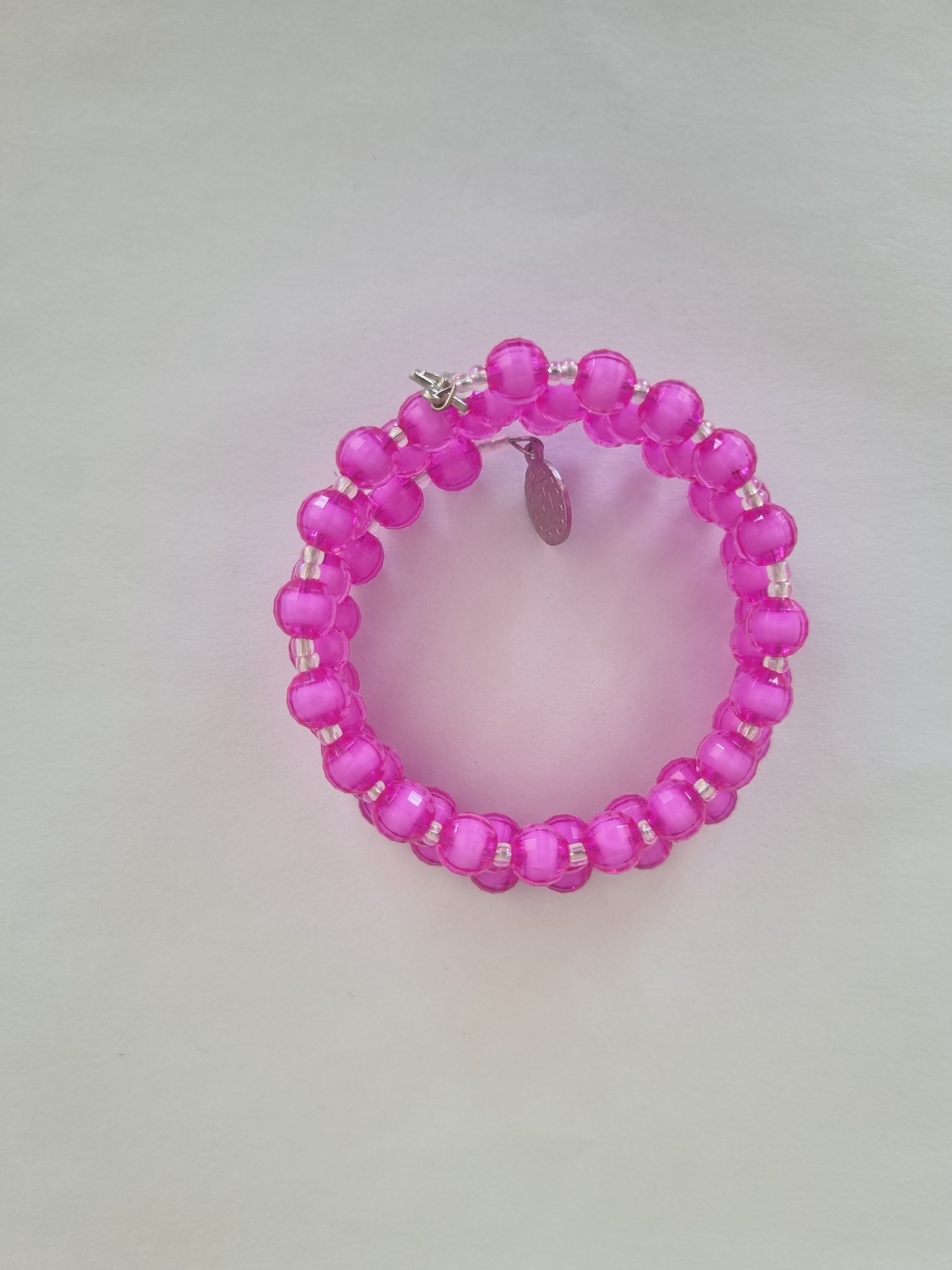 Hot Pink Catholic rosary bracelet with devotional medal and crucifix charm