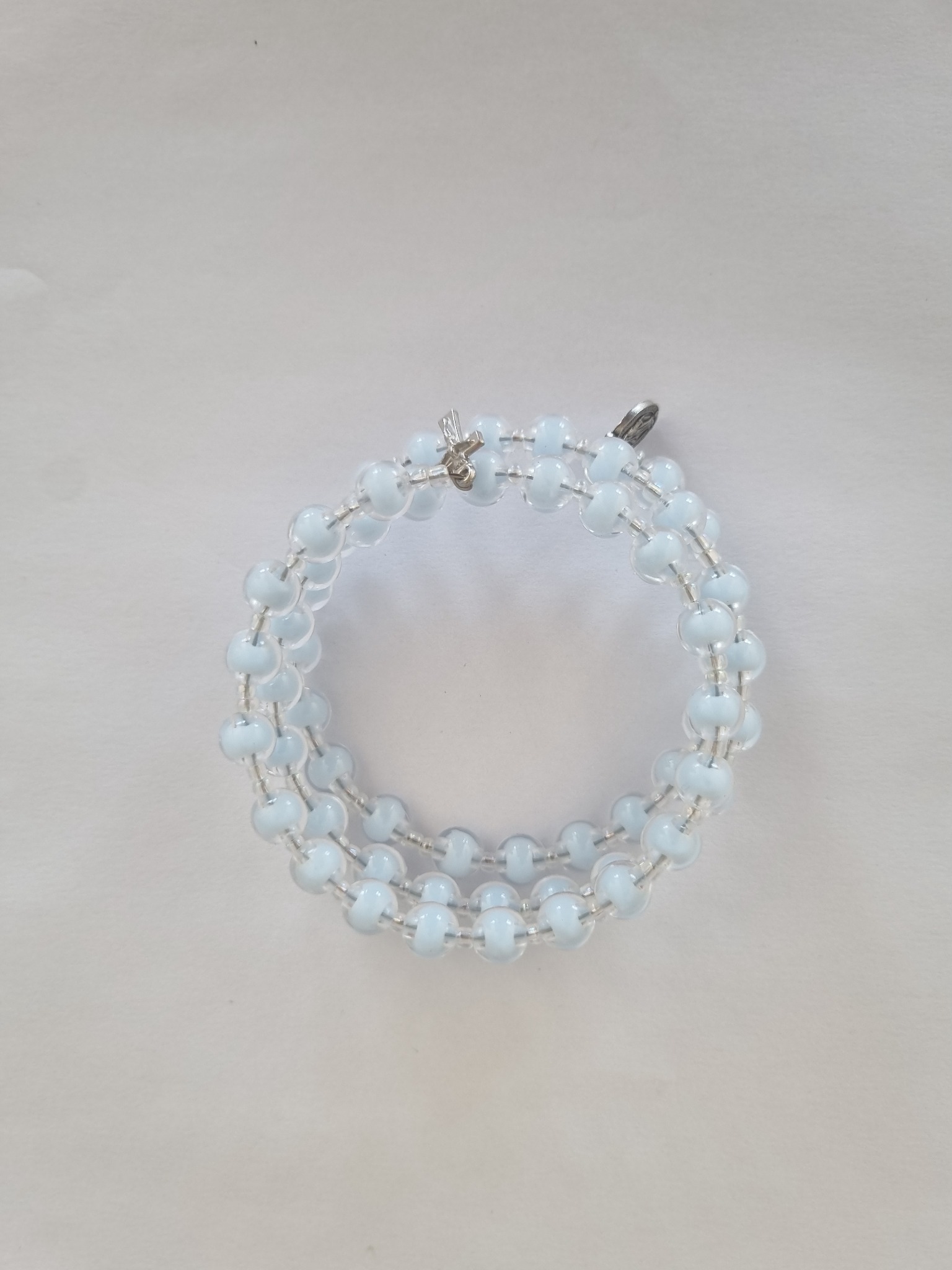 Light Blue Catholic rosary bracelet with devotional medal and crucifix charm