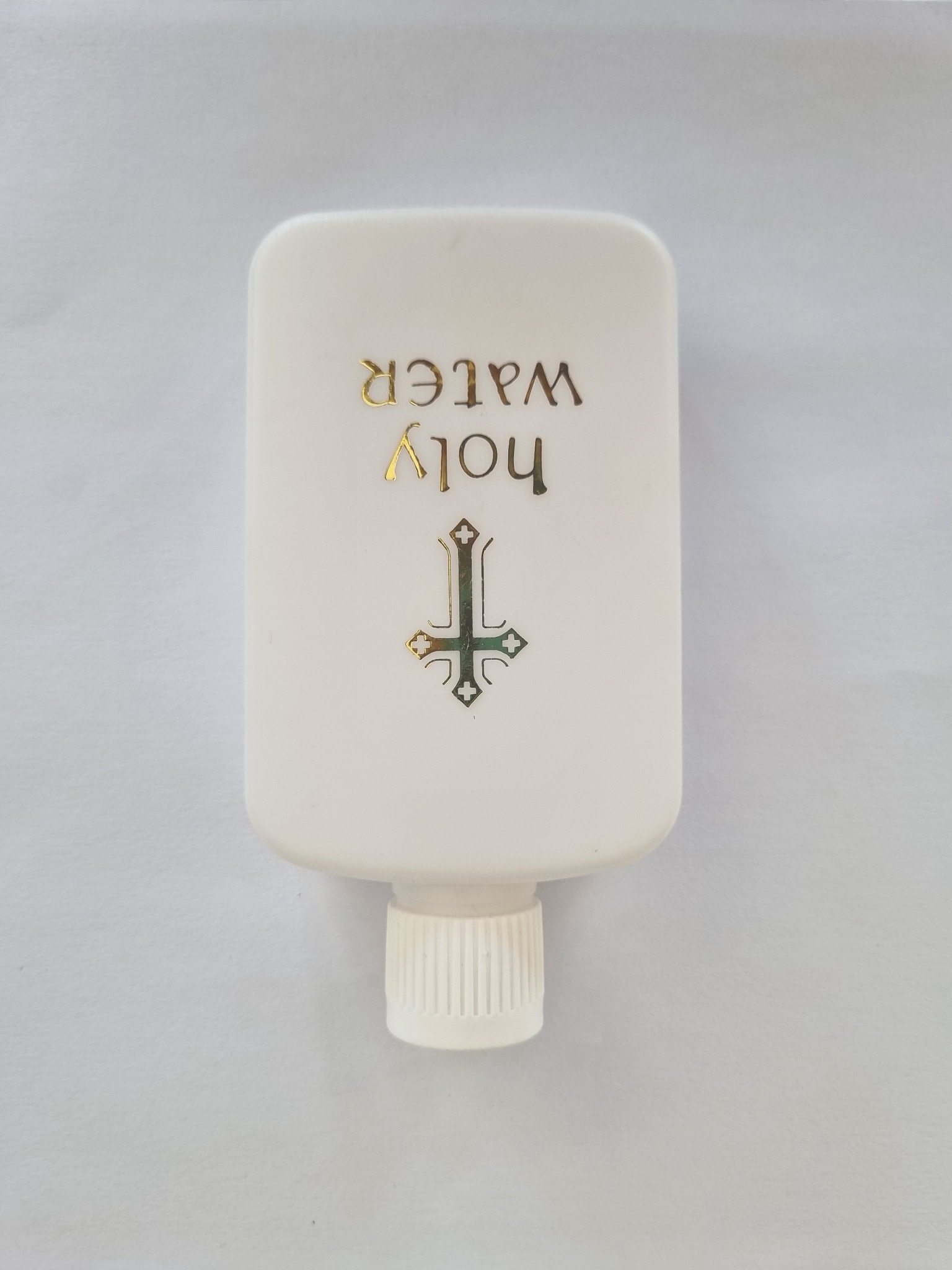 Square white holy water bottle with Holy Water text and cross