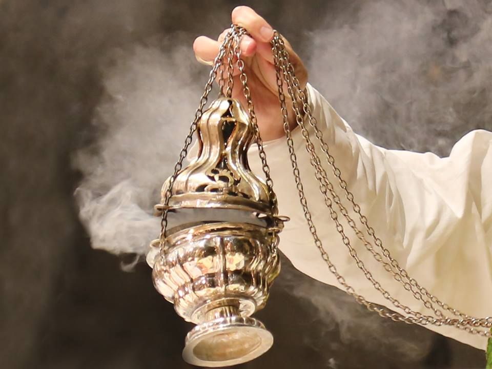 Close-up of a smoking Catholic thurible