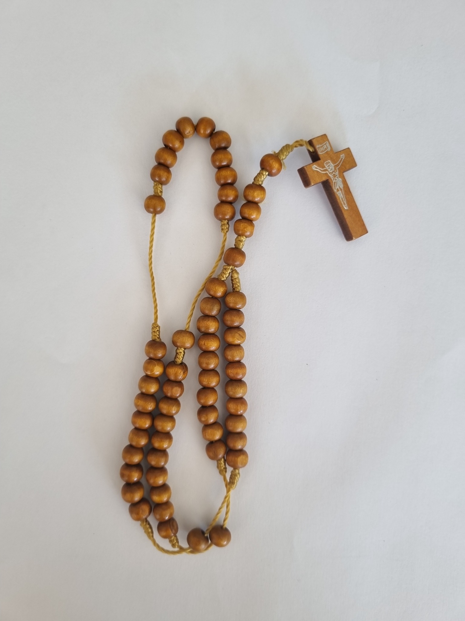 Natural brown wooden Catholic rosary with wooden crucifix